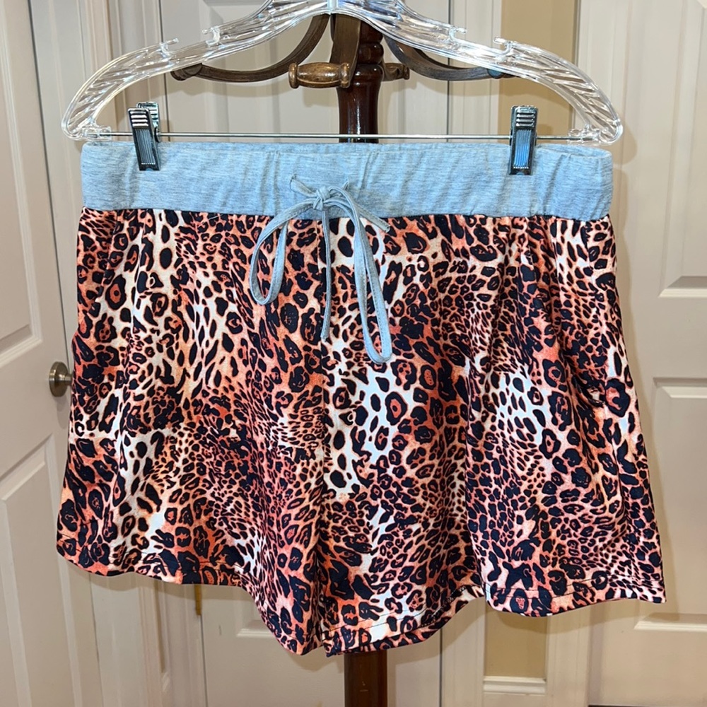 NWOT super Cute Leopard Print Shorts with side pockets.